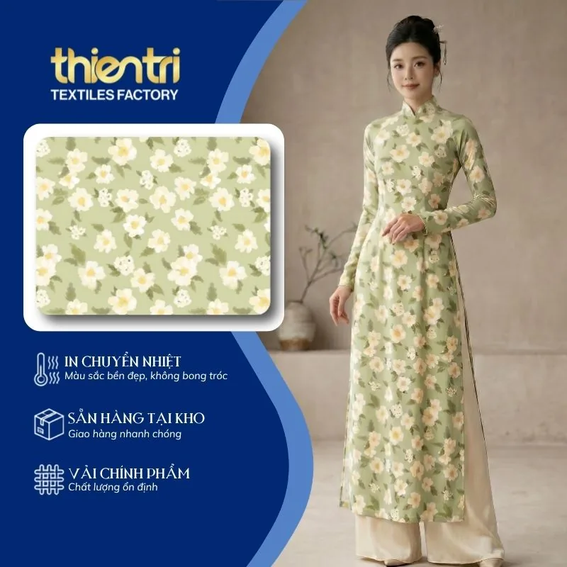 Mẫu áo dài may từ vải in họa tiết hoa trắng nhụy vàng của Thiên Trì