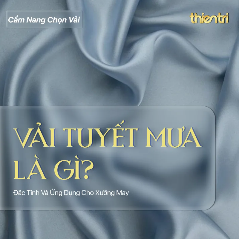 Thẻ tiêu đề bài Vải Tuyết Mưa Là Gì, chữ vàng trên nền nền vải màu xanh xám nhạt, kèm logo Thiên Trì Textiles Factory